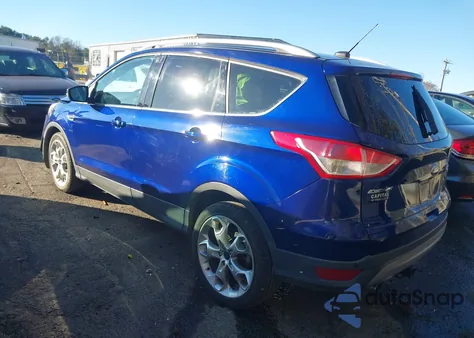 2013 Ford Escape Titanium z USA, uszkodzony, nr VIN 1FMCU0J92DUC41289